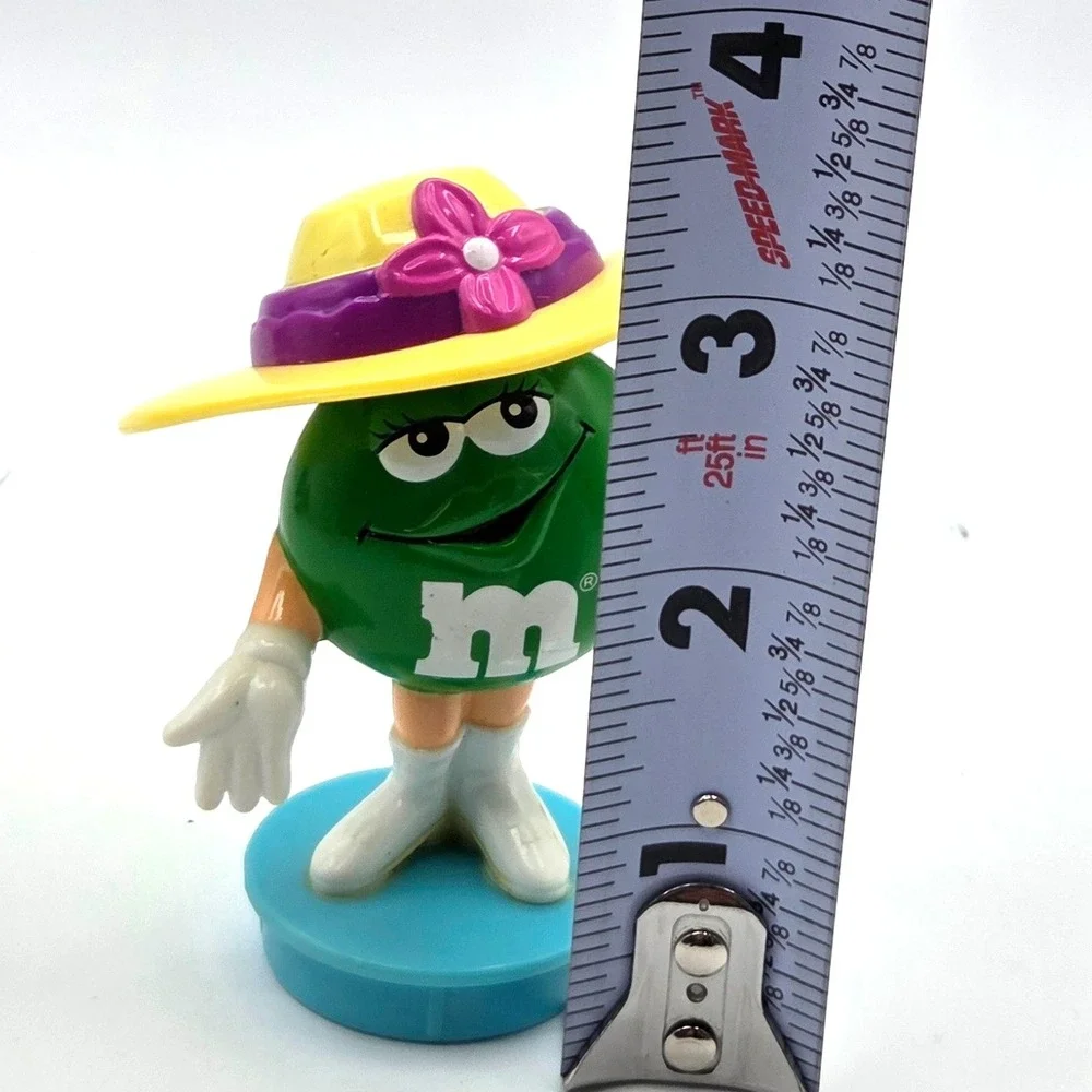 Green M&M Wearing a Yellow Hat Tube‎ Topper